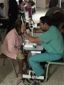 Dr. Kasner Performing an Eye Exam